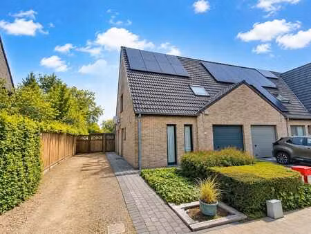 rustig gelegen halfopen woning met grote tuin  warmtepomp...