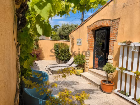 maison de caractère en pierre rénovée avec goût piscine