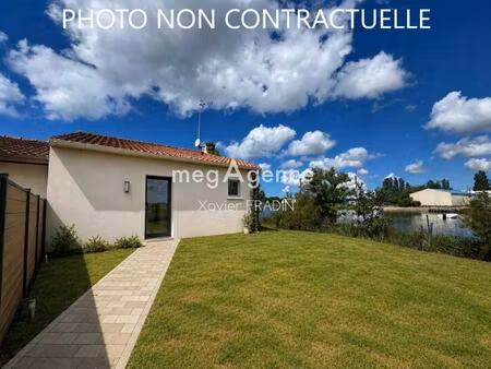 appartement 35m² de plain-pied avec un extérieur de 90m² et stationnement