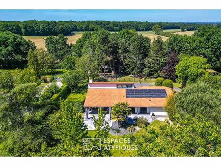 maison familiale dans un écrin de verdure