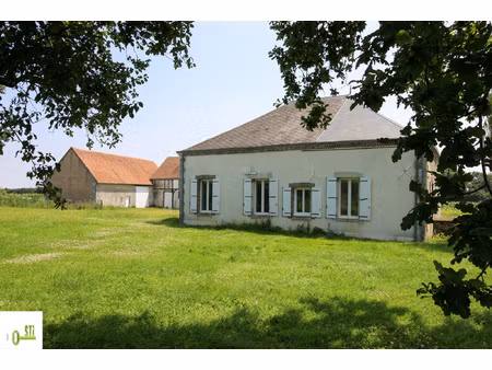 maison avec grandes dépendances