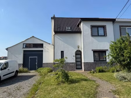 goed gelegen woning met ruime loods