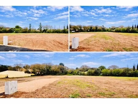 vente terrain constructible 500 m2 plat et viabilisé environnement calme accès a75 rapide