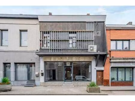 maison 3 façades avec jardin et commerce