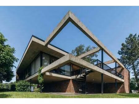le modernisme épuré dans la maison d'architecte de r. vanhoo