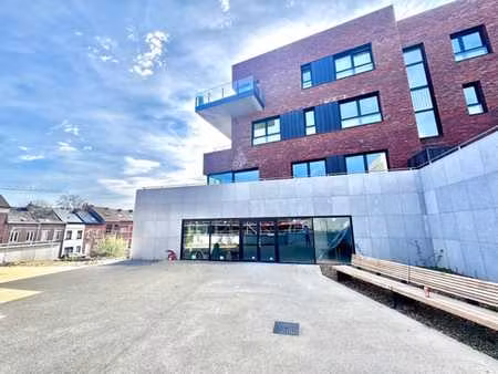 local commercial neuf casco +-207m2 proche centre-ville