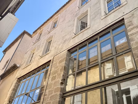 immeuble signature au charme industriel & prestige urbain
