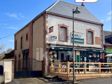 ensemble immobilier 400 m2 avec cour  jardin et garages poss