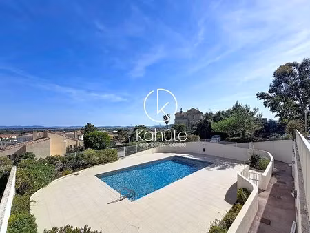 hyeres mont soleil 3 pièces - 61 m2  piscine  tennis  parking  cave  vue mer