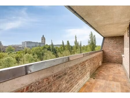 zeer groot dubbel appartement  schitterend uitzicht vanaf twee terrassen  2 kelders  2 afg