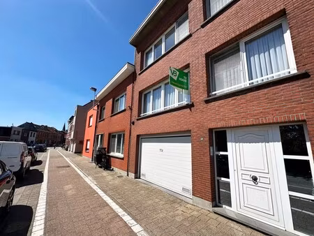 verzorgd appartement met twee slaapkamers  inpandige garage  terras én tuin te borsbeek!