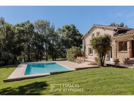 élégante villa avec piscine entourée de son parc arboré à l'isle jourdain
