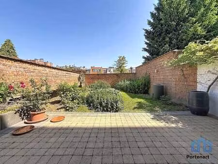 appartement avec jardin privé + garage + cave !!