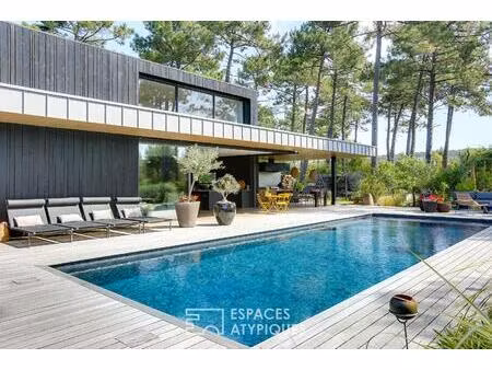 l'immersion sauvage : villa contemporaine entre forêt et océan