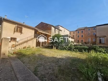 maison de ville avec studio indépendant  grand garage de 70 m² et jardin clos en plein cen