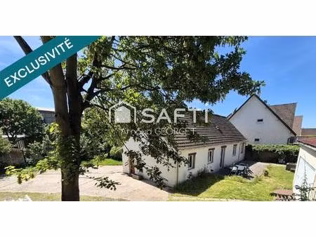 maison 5 chambres avec 610 m² de terrain à 200 m à pied du tramway t7