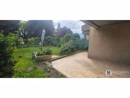 jarrie - appartement 1 pièce + jardin