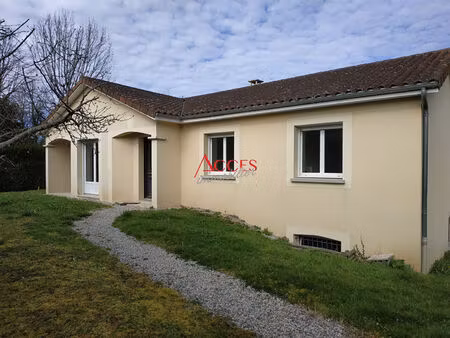 terrain constructible et maison louée à vendre