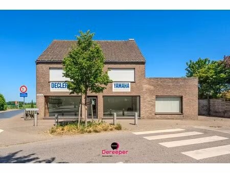 karaktervolle woning met ruime bijgebouwen  showroom en atelier op een perceel van 2.084 m