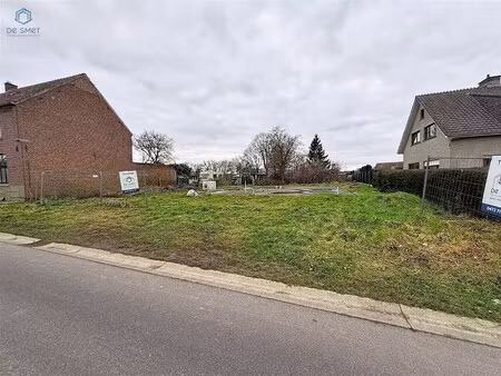 bouwgrond met vergunning en plannen te koop te lierde.