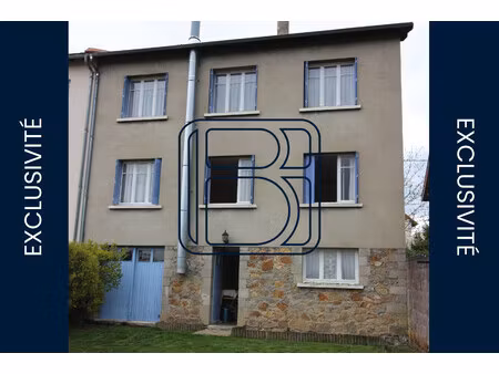 immeuble avec 2 appartements t4 et garages avec terrain