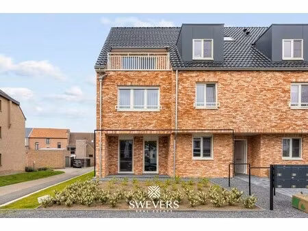 modern gelijkvloers appartement met privétuin en dubbele parking