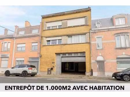 immeuble avec entrepôt de 1.000m2  avec appartement.