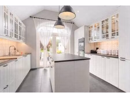 à vendre: maison avec grand jardin à westende