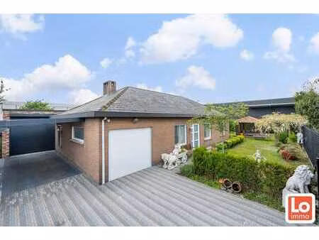 mooie instapklare open gelijkvloers woning met extra gara...