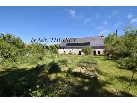 dépt.15  montboudif  ancien corps de ferme  3 pièces  grange  garage et terrain de 2006 m2
