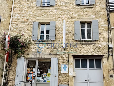 maison de village avec commerce loué  appartement rénové et