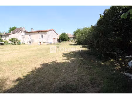 maison de caractère d'environ 118 m² avec dépendances