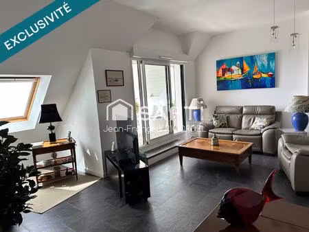 appartement premium de 106 m2 disposant d'une vue mer situé en coeur de ville à saint-brév