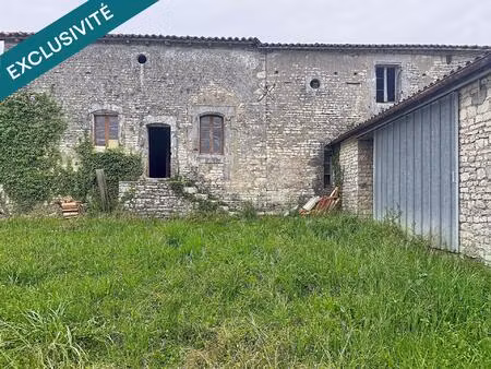 maison en pierre avec grange