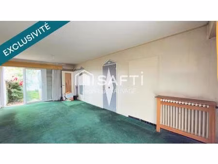 maison 1950 à rénover avec garage et jardin