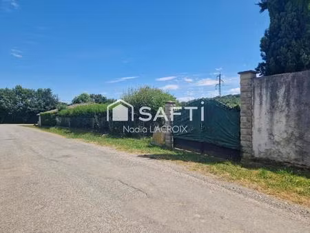terrain de 954 m²  clôturé  non viabilisé