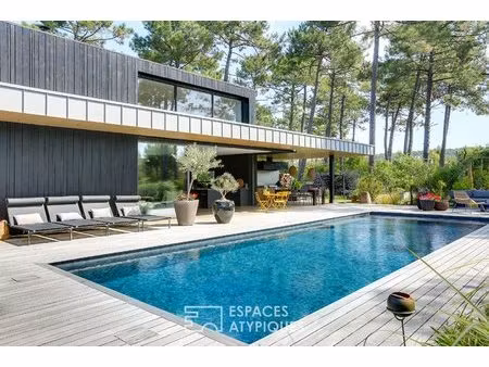 l'immersion sauvage : villa contemporaine entre forêt et océan