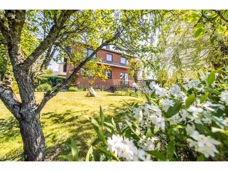 une villa à révéler avec jardin dans un quartier d’exception