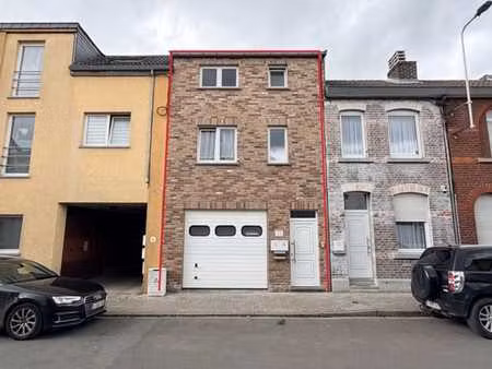immeuble 2 appartements et 1 grand garage de 40 m²