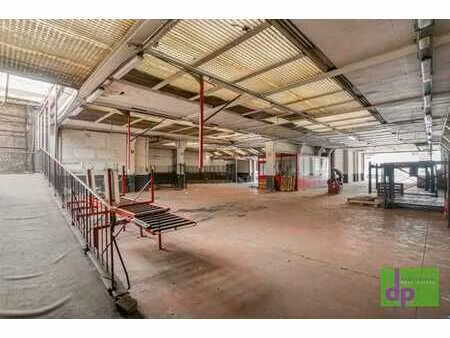 bâtiment industriel de 1.245 m² + jardin 270 m²