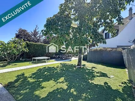 spacieuse maison avec garage et agréable jardin
