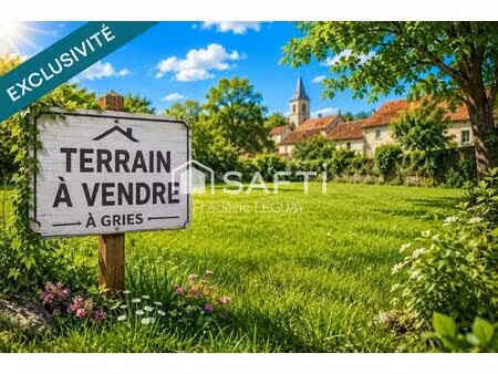 terrain au cœur du village