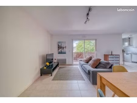 appartement 3 pièces 66 m² belle terrasse couverte sud ouest