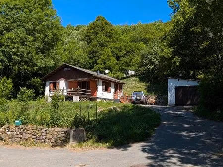chalet à rénover avec garage  terrasse et terrain 1 500 m²