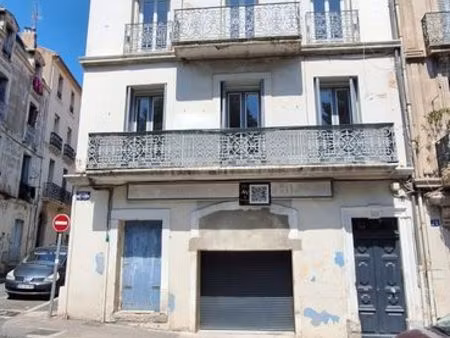 immeuble de rapport –face parc des poètes – fort potentiel de 5 appartements – garage 4/5 