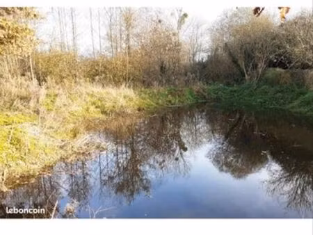 terrain avec etang 1500m2
