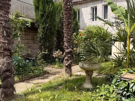 appartement avec 150m2 de jardin et dépendance en hyper centre rare
