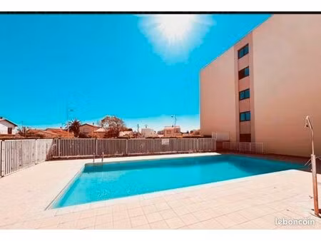 a vendre place de parking et cave de 6 m2 a avenue eugene sauvy avec acces piscine