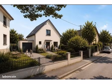 maison individuelle 100 m² avec jardin  garage et cuisine équipée