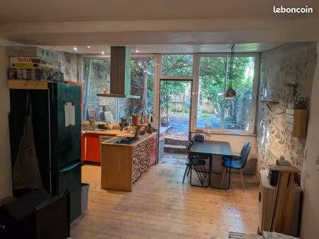 maison de ville avec jardin et dépenses
